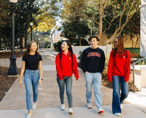 UGA students walking on campus.