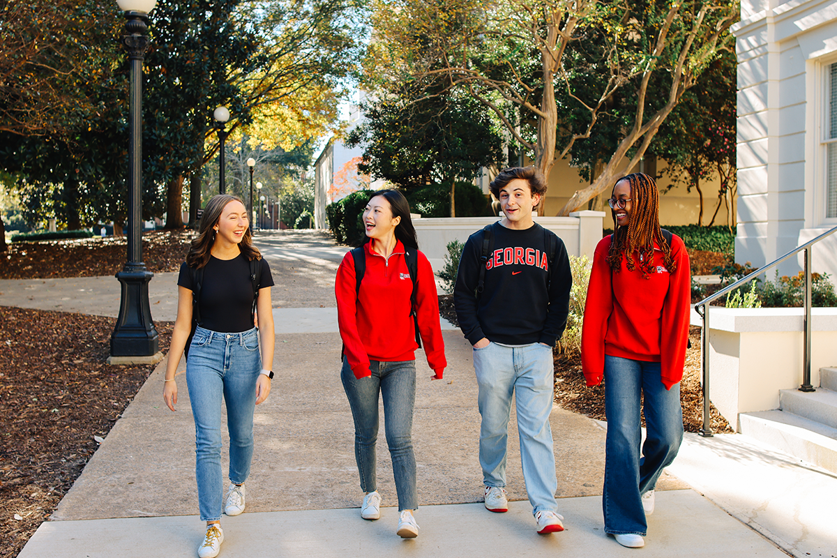 UGA students walking on campus.