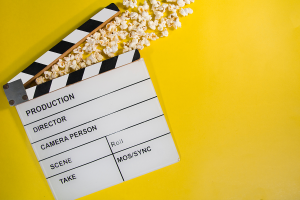 Film Director's Clapboard with Popcorn