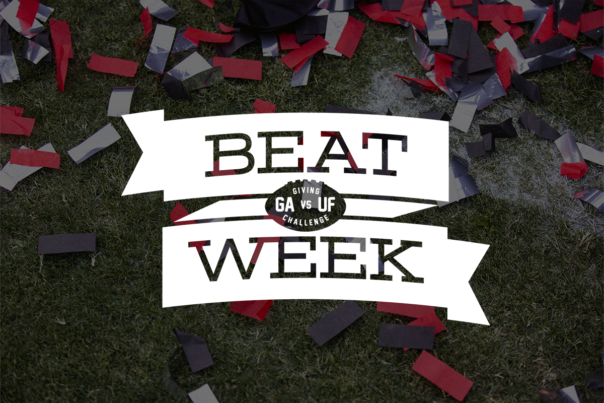 photo of confetti on football field with Beat Week logo on top