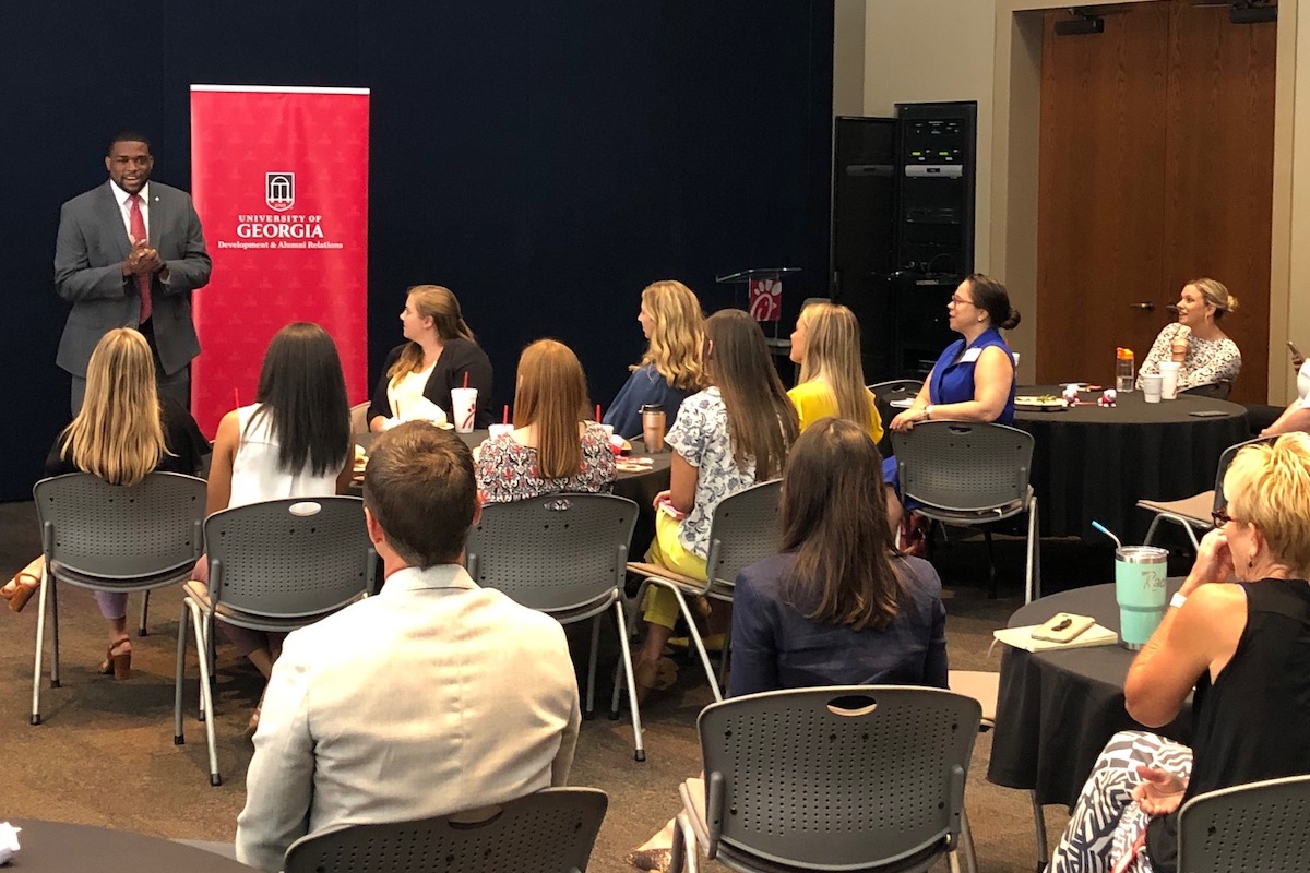 Johnelle Simpson, former UGA SGA president, speaks to a corporate alumni group from Chick-Fil-A