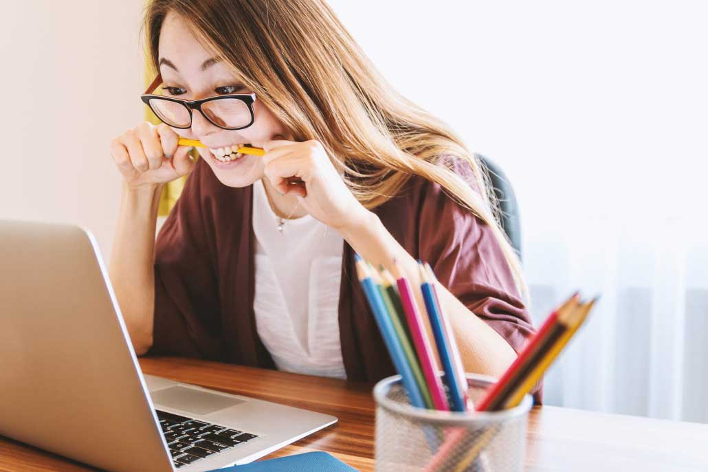 Photo of woman at laptop computer